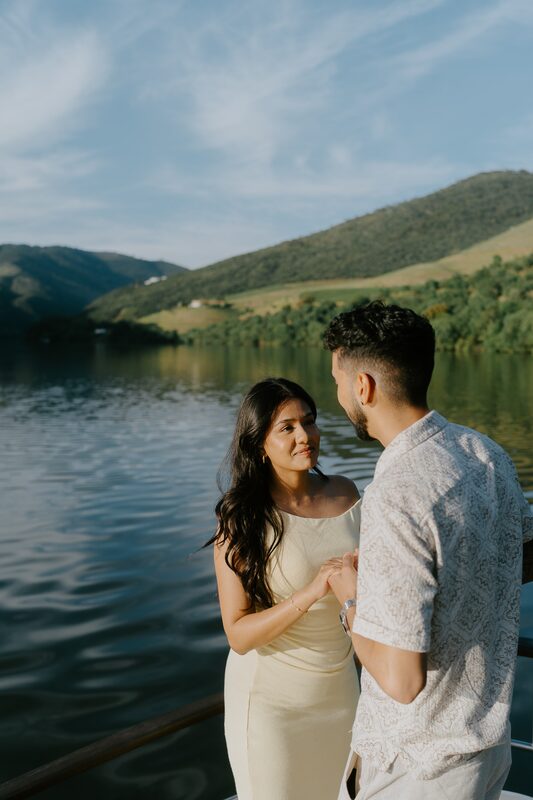 Couple on boat with mountains
