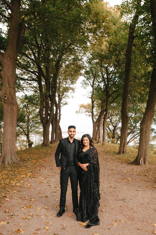 Couple in tree-lined path